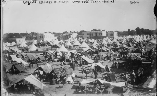 Tents in front of buildings.